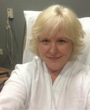 Amy Berman prepares for her single, larger dose of image-guided radiation therapy.