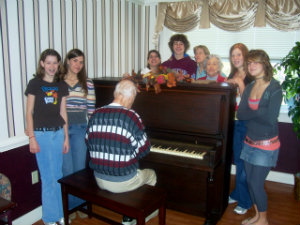 Rosemary Rawlins' father plays piano for his children and grandchildren.