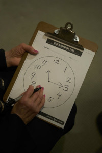 Part of the cognitive screening test involves drawing the face of a clock, with the numbers in the proper positions, and then being asked to draw the hands on the clock for a specific time.