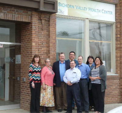 From left, Bighorn Valley Health Center (BVHC) board members Luella Brien and Cari McCleary; U.S. Sen. Jon Tester of Montana; Bighorn County Commissioner Sidney Fitzpatrick; BVHC Medical Director Earl Sutherland (front); BVHC CEO David Mark, MD; and board members Carlene Old Elk and Alma McCormick.
