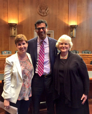 From left, Dr. Kate Lally, Dr. Atul Gwande, and Amy Berman in the Dirksen Senate Office Building hearing room where they testified.