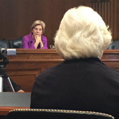 U.S. Sen. Elizabeth Warren, D-Mass., listens intently as Amy Berman testifies before the Senate Special Committee on Aging.
