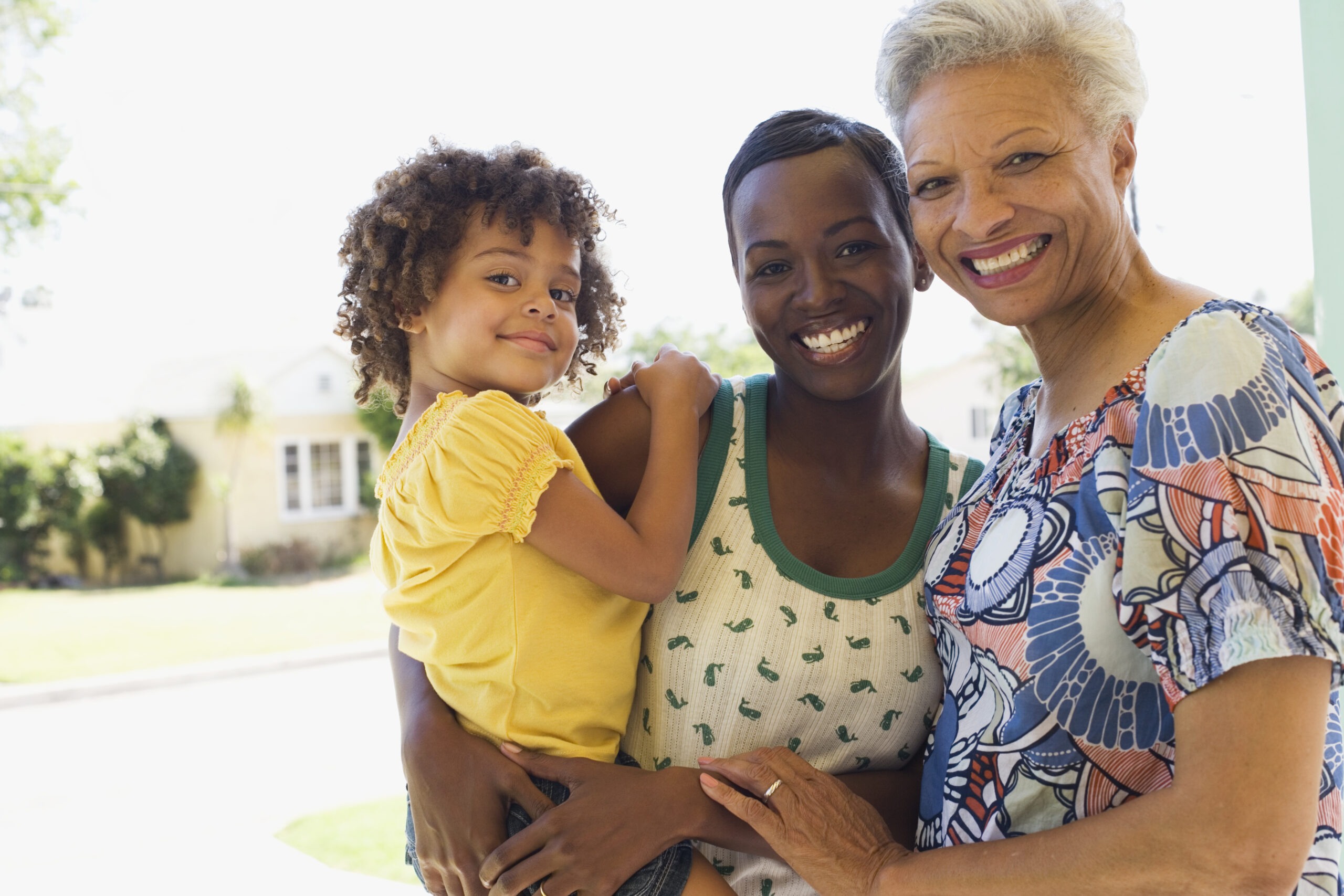 Three generations of women bonding outdoors