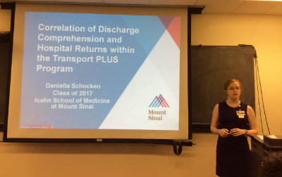 Daniella Schocken, a student at the Icahn School, presents on her research on a Mount Sinai emergency department program that deploys EMTs to help older adults transition home after hospitalization.